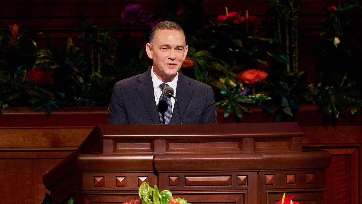 Elder Alexander Dushku speaking at the general conference pulpit