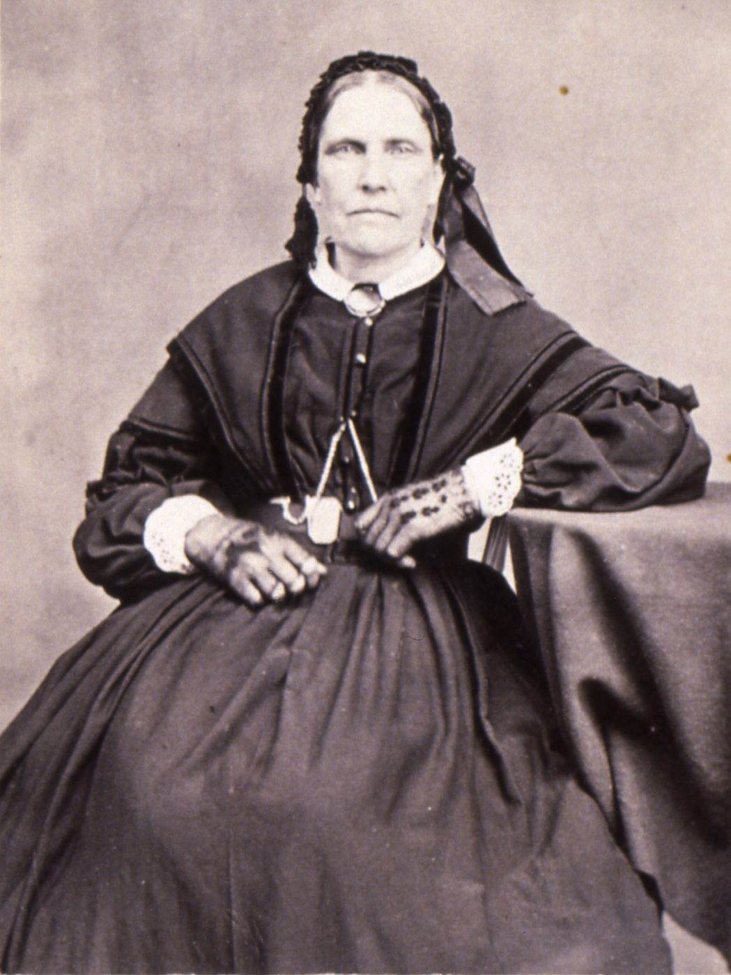 Portrait of Amanda Barnes Smith in later life, seated, in a dark dress