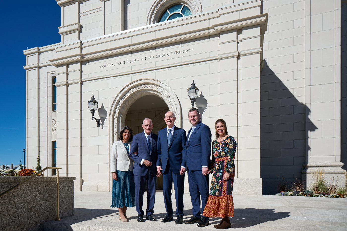 President Eyring standing with other leaders and their wives at the entrance of the Montpelier Idaho Temple
