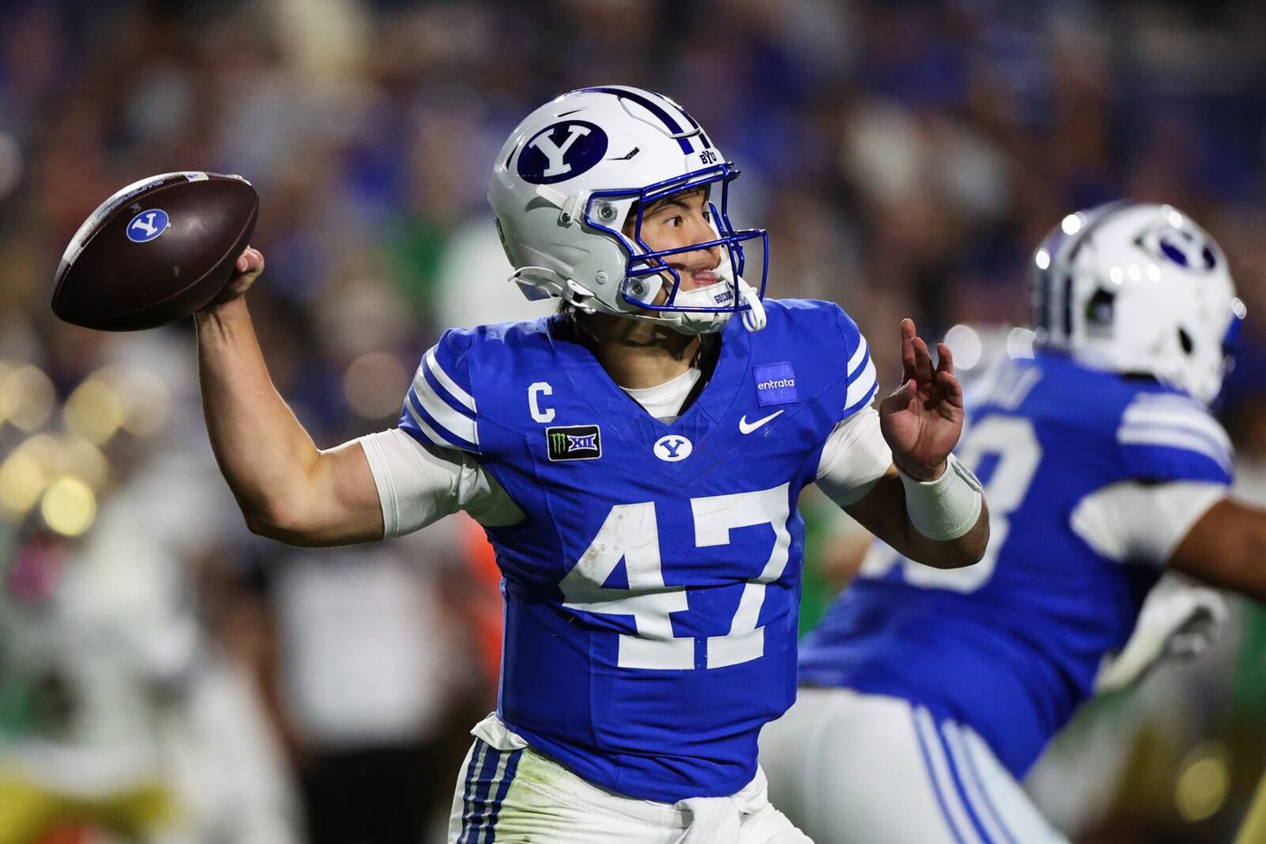 BYU quarterback Bear Bachmeier throwing a pass against Notre Dame