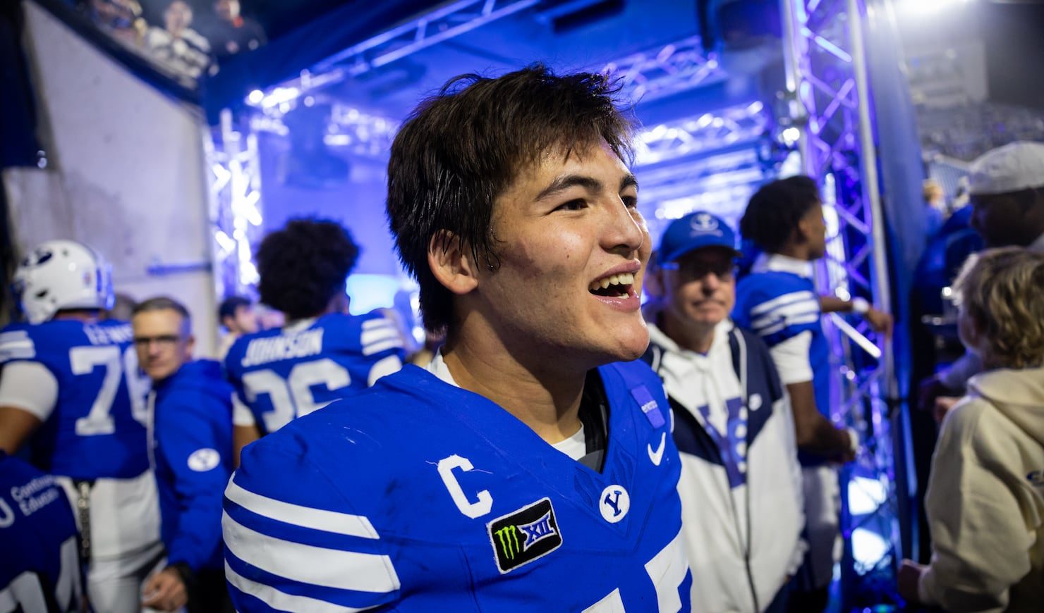 BYU quarterback Bear Bachmeier smiling in his No. 47 jersey in the tunnel after the win over Notre Dame